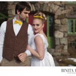 Bride with cateye liner and red lips posing with groom at Willowdale Estate